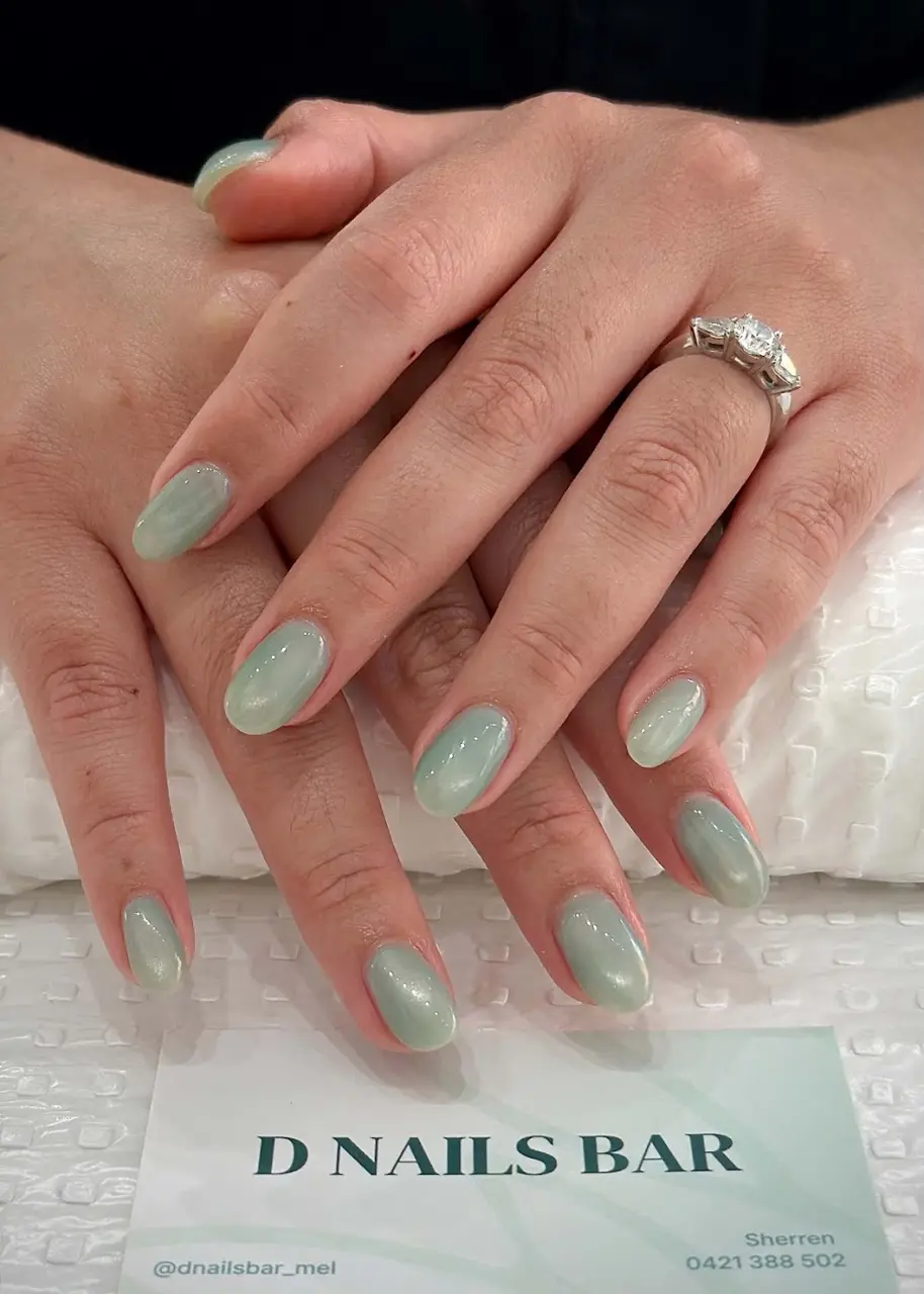 Sage green almond nails done at D Nails Bar, South Yarra